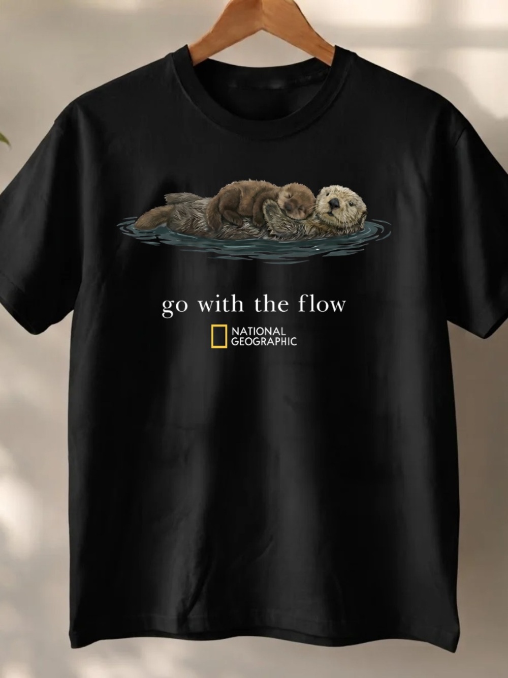 Gildan Black Tee with Otter Illustration and "Go With The Flow" Slogan